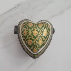 Green and white heart-shaped porcelain trinket box with rose details